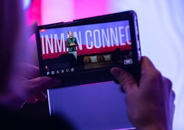 woman watching conference on a screen