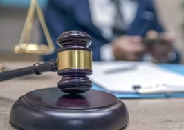 Boston agent pleads guilty to false marketing scheme